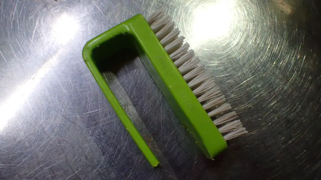 Use a nail brush 